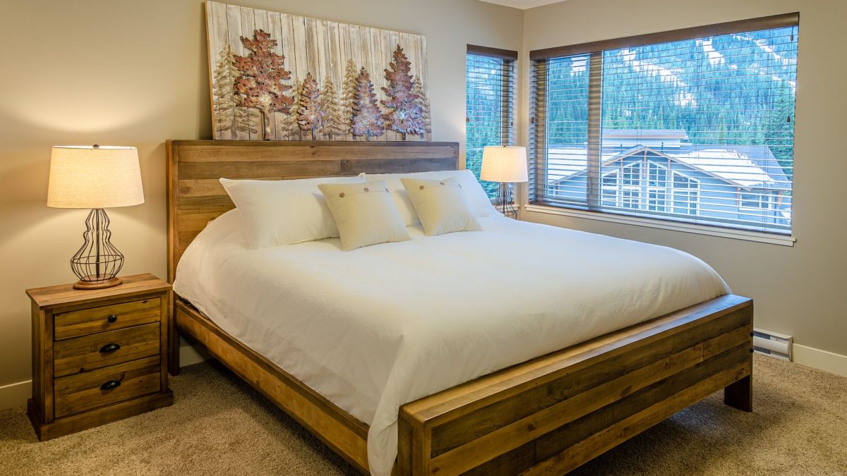 Bedroom looking out onto pine covered slopes