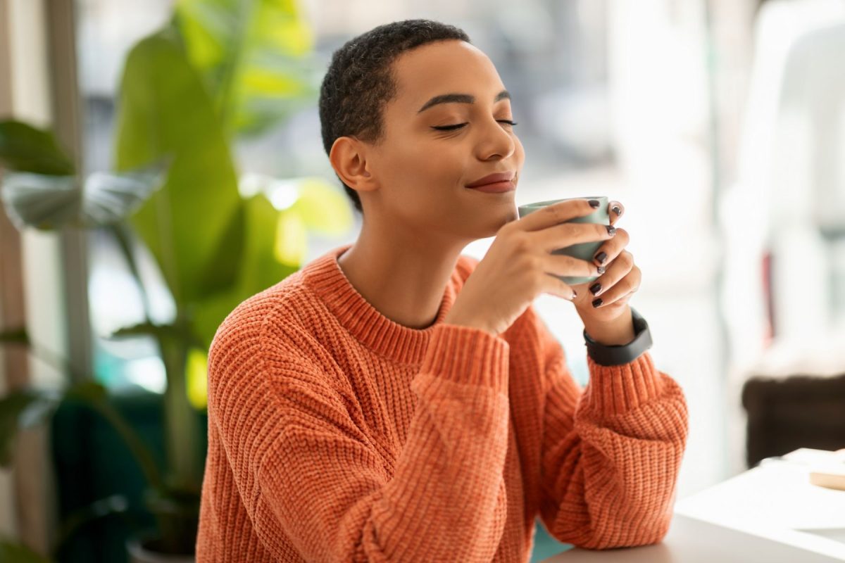 woman at cafe with coffee