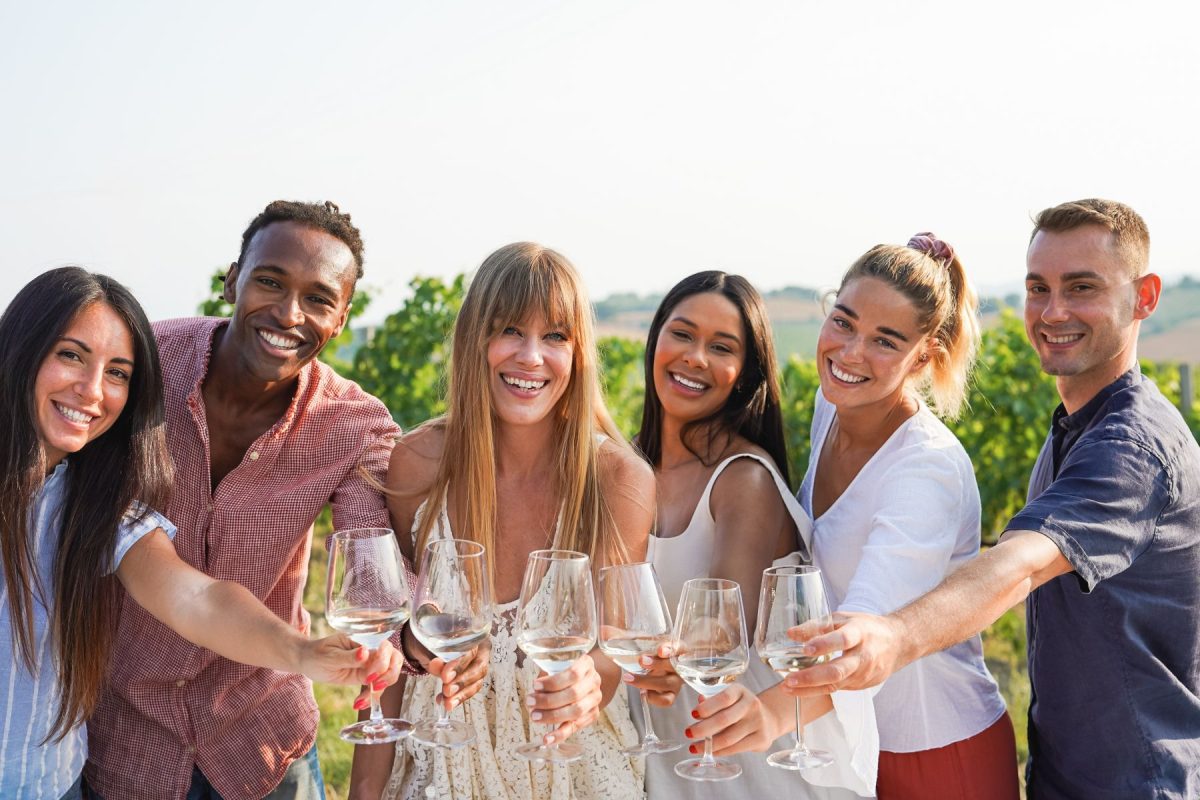 friends toasting at a winery